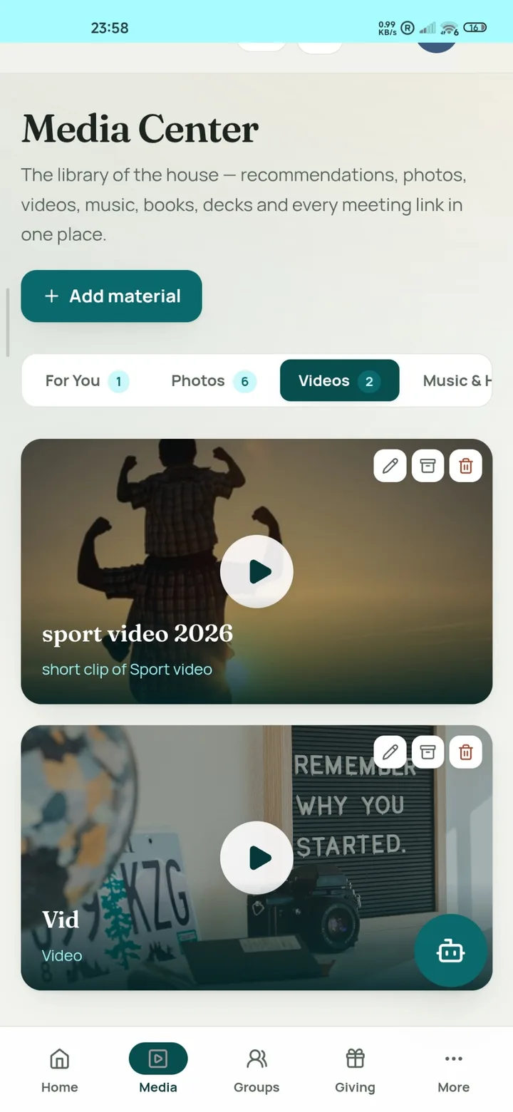 Media Center screen with photos, videos and music organized into categories